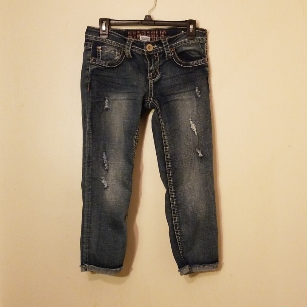Hydraulic distressed jeans